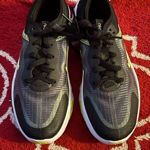 Nike Kids Black Sneakers with Neon Yellow Accents